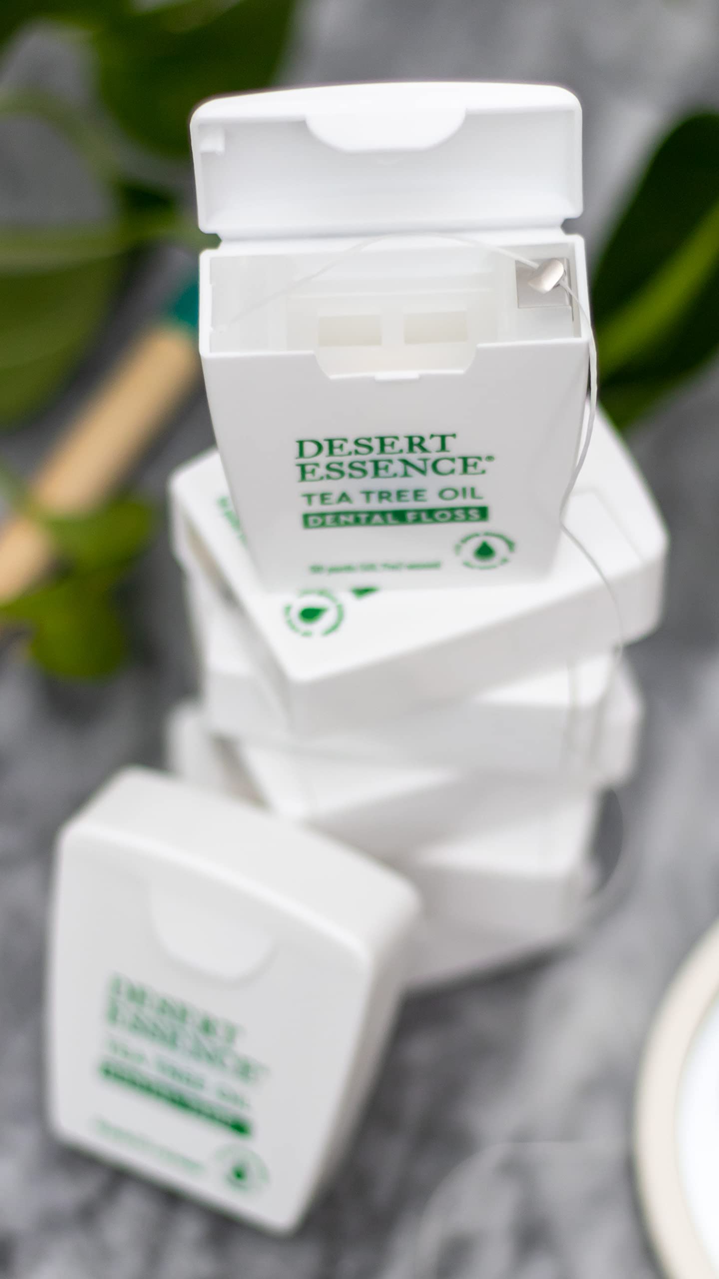 Desert Essence Tea Tree Oil Dental Floss - 50 Yards, Beeswax-Coated, Thick No-Shred Tape