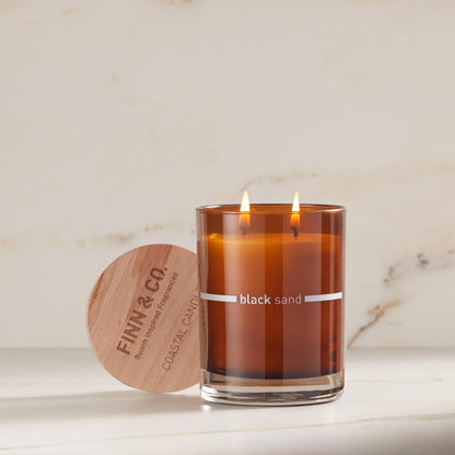 FINN & CO. Black Sand Candle – 9.5 oz Soy Wax, Amber Jar, Beach-Inspired Scent